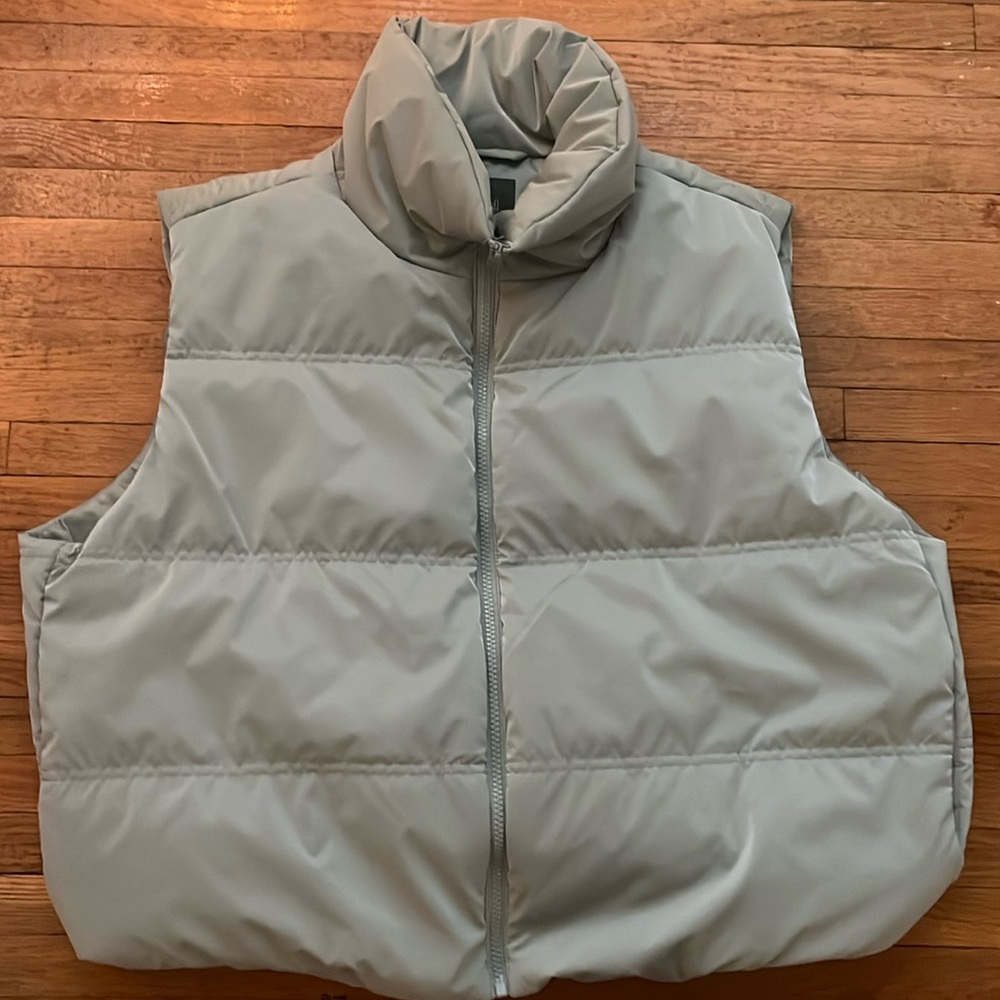 Vest is from target, the brand is wild fable on a size XXL and it’s light green